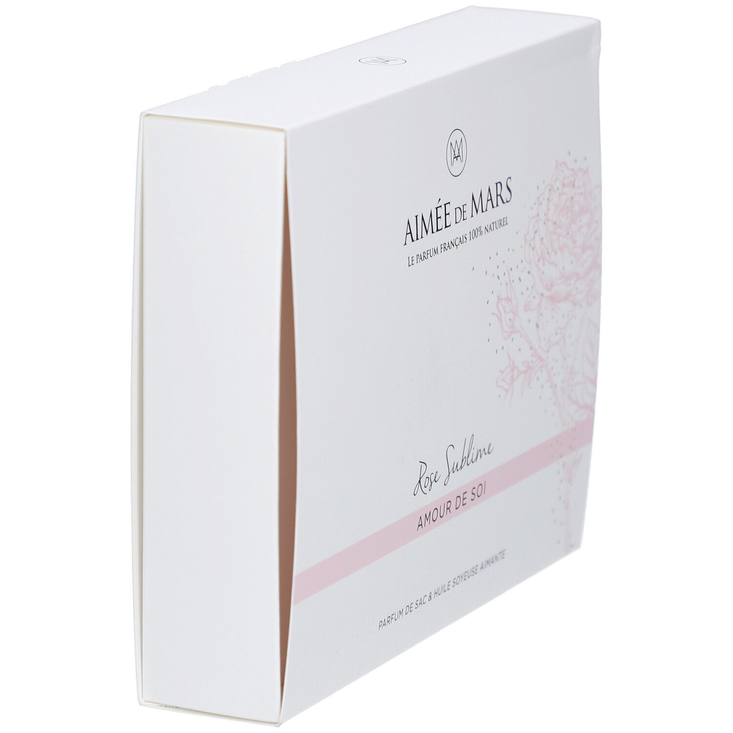 Coffret blanc incliné. Inscription : Aimée de Mars, Rose Sublime, Amour de Soi. Motif de rose rose.