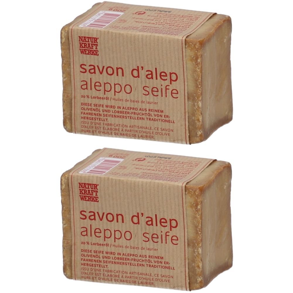 Deux blocs de savon d'Alep avec une bande de papier. Impression : Natur Kraft Werke, Savon d'Alep, Aleppo Seife.