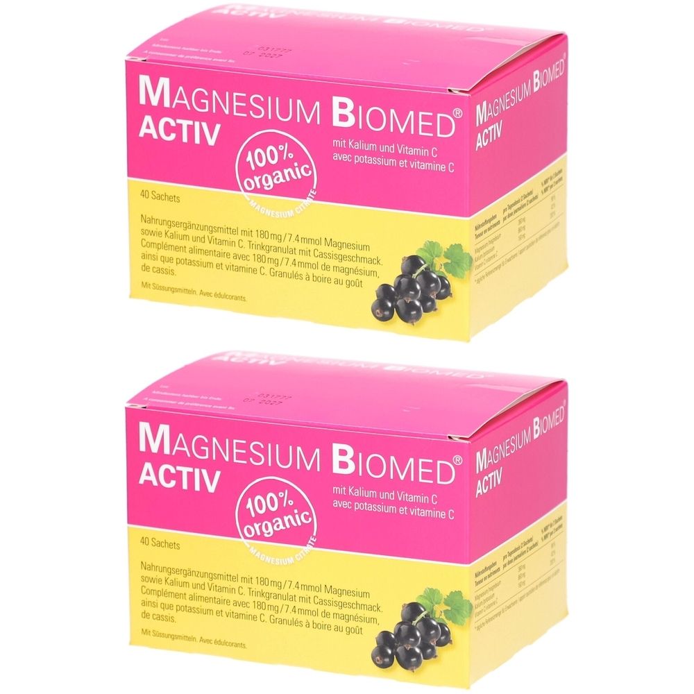 Deux boîtes de Magnésium Biomed Activ. Boîtes roses avec nom du produit et informations complémentaires. Inscription : 100% organic.