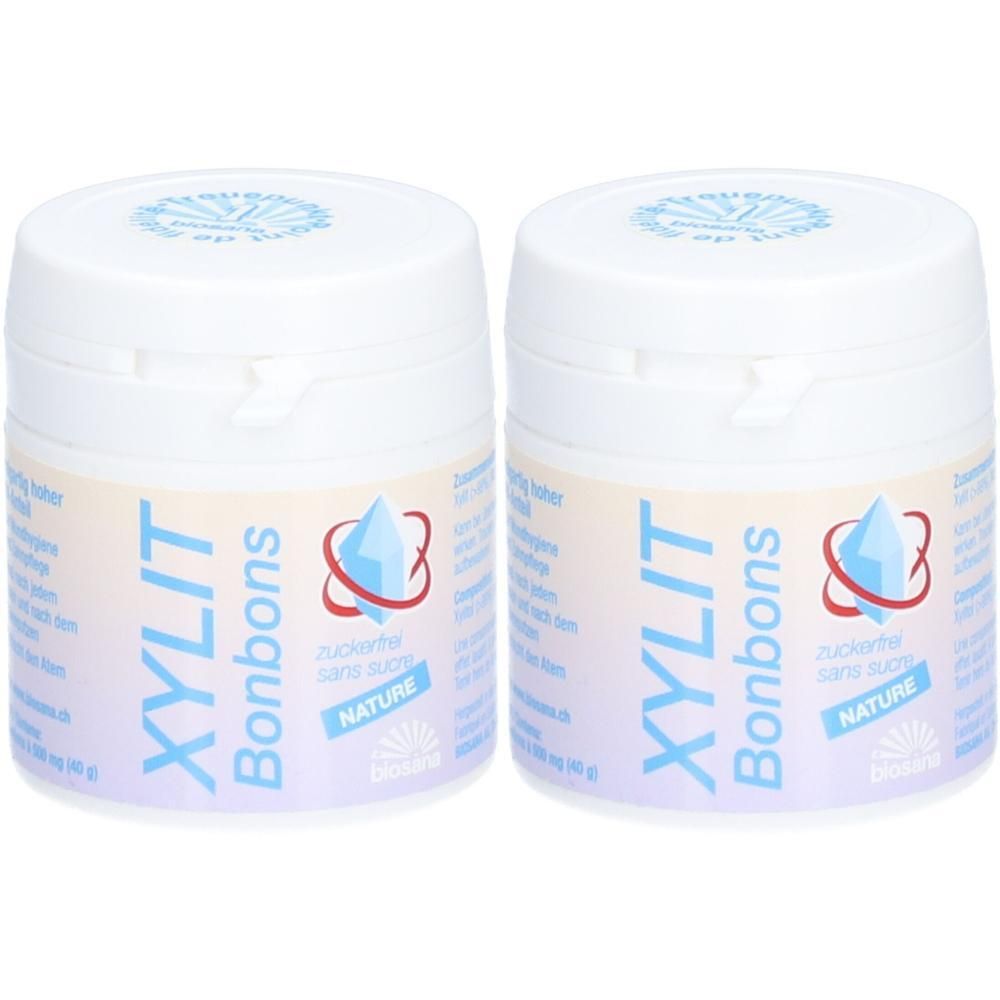 Deux contenants blancs avec des bonbons XYLIT Nature.