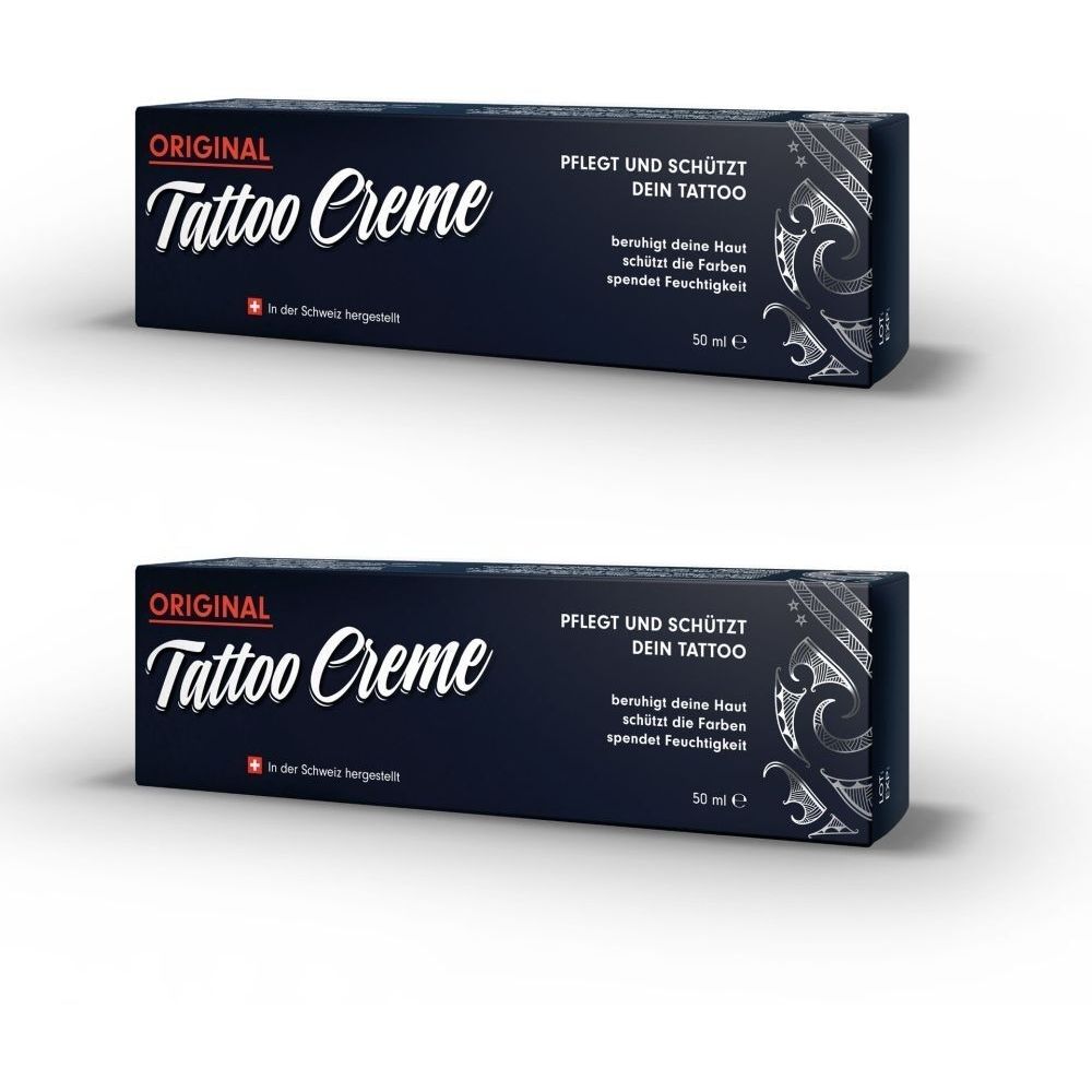 Deux boîtes de crème ORIGINAL Tattoo. Emballage noir avec texte blanc. Drapeau suisse. Texte: Soigne et protège votre tatouage.