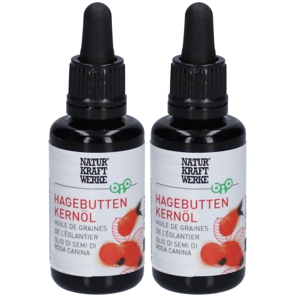Deux flacons d'huile de graines d'églantier avec bouchon noir et étiquette. Inscription : NATUR KRAFT WERKE, Hagebuttenkernöl.