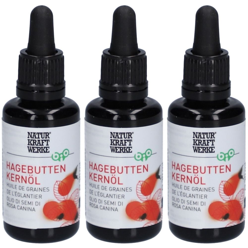 Trois flacons d'huile de graines d'églantier bio. Bouchons noirs avec pipettes. Étiquettes blanches avec nom et logo.