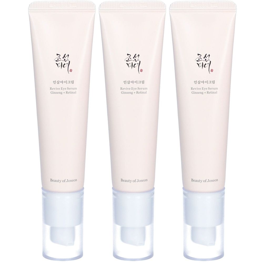 Trois tubes de sérum pour les yeux BEAUTY OF JOSEON Revive Ginseng Netzhaut. Tubes rose clair avec bouchons blancs. Texte noir.