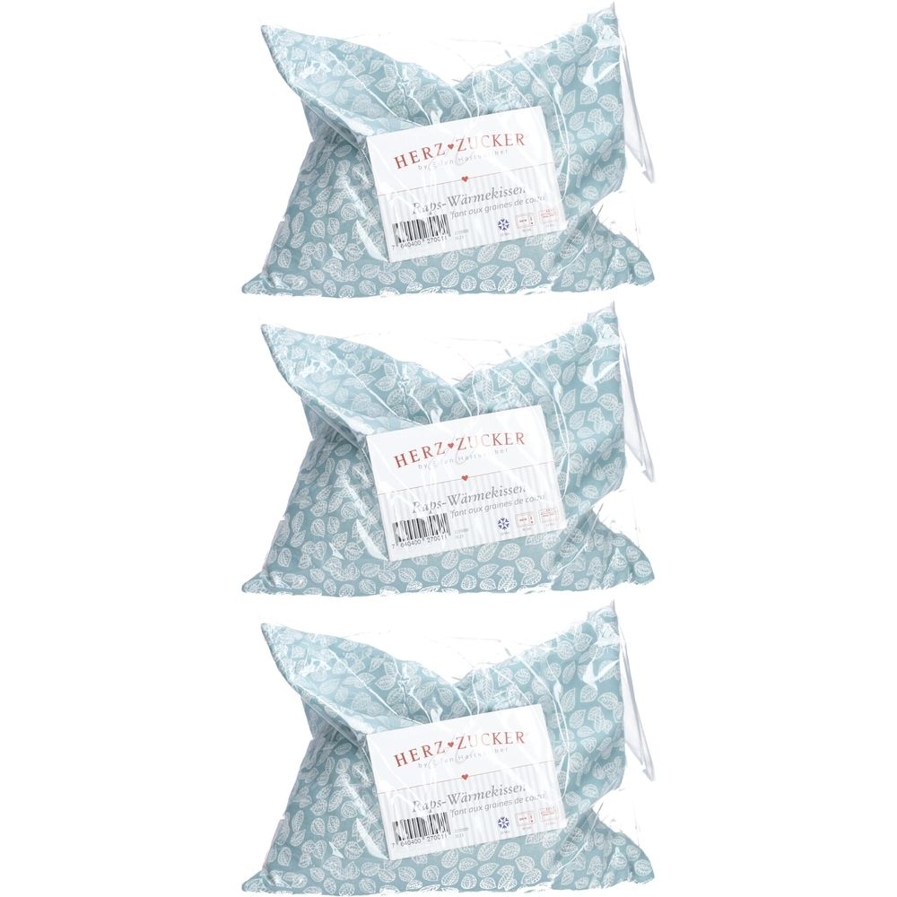 Trois coussins chauffants HERZZUCKER® avec graines de colza, emballés. Motif bleu clair, étiquette blanche avec informations.
