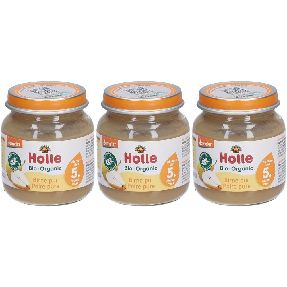 Trois pots de purée de poires Holle Bio-Organic. Pots avec couvercles orange et étiquettes avec informations sur le produit et logo.