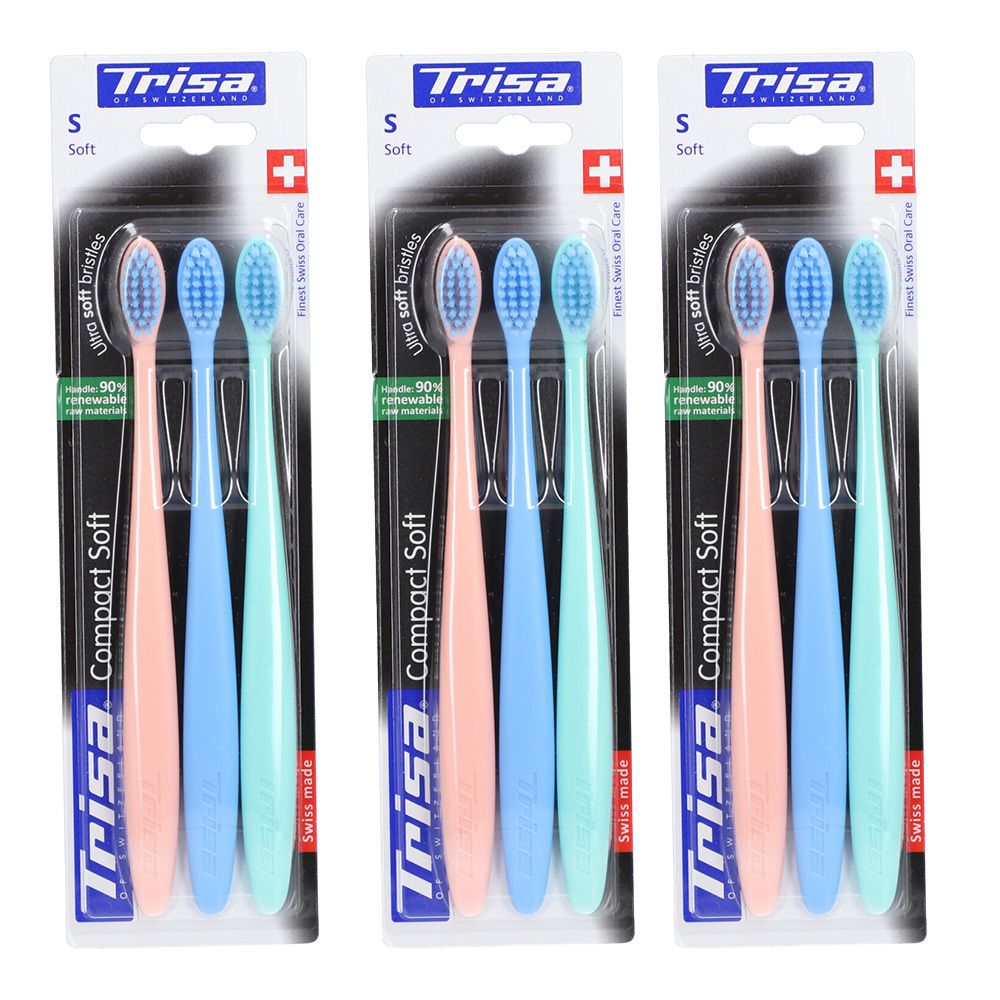 Trois paquets de brosses à dents. Chaque paquet contient trois brosses à dents roses, bleues et vertes. Marque : Trisa Compact Soft.