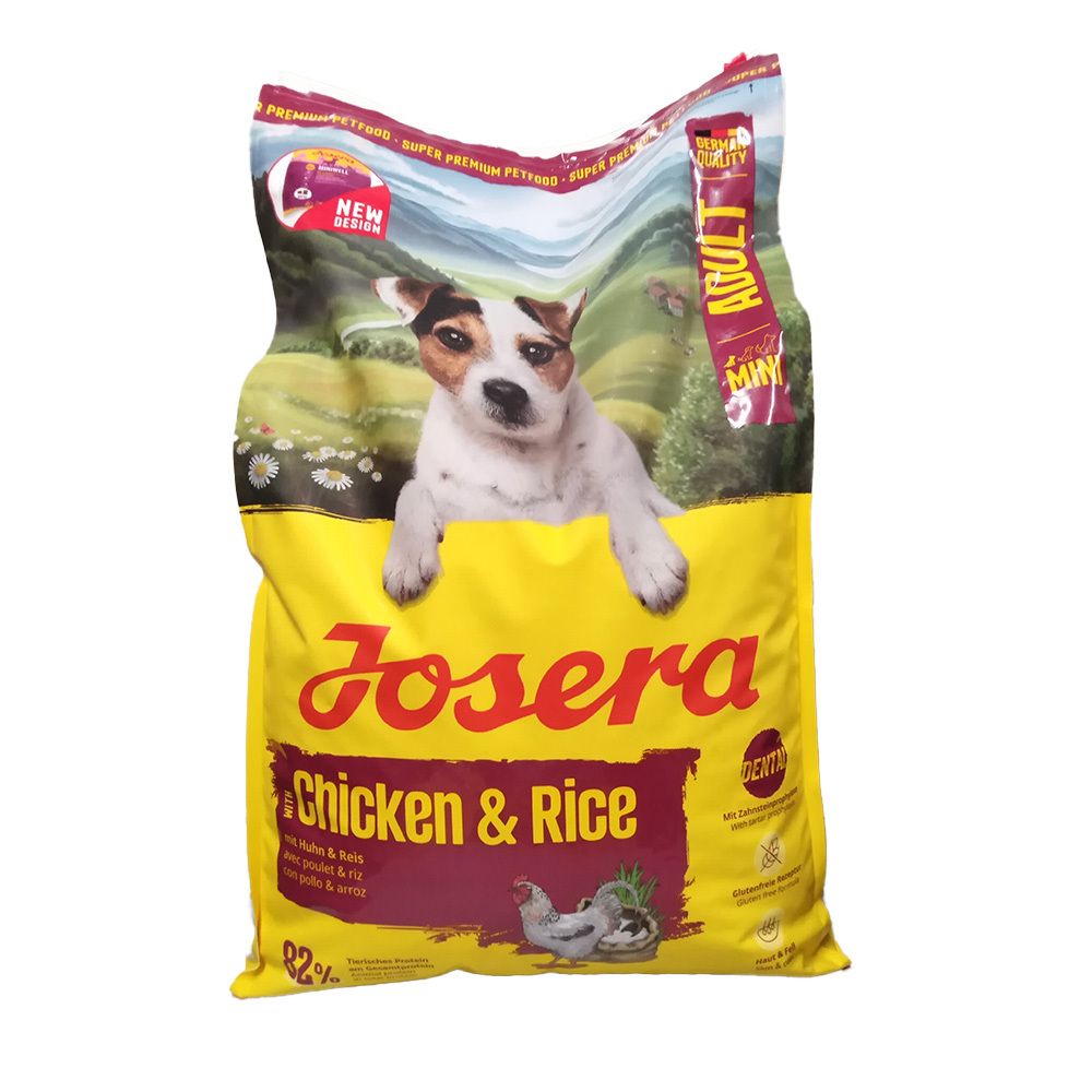 Dos d'un sac de nourriture pour chiens Josera "Chicken & Rice" avec tableau nutritionnel et guide d'alimentation.