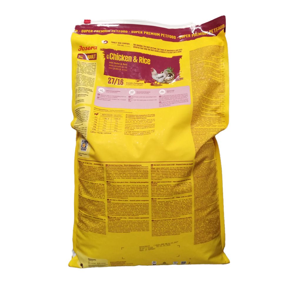 Vue latérale d'un sac de nourriture pour chiens Josera "Chicken & Rice" avec informations et image de chien.