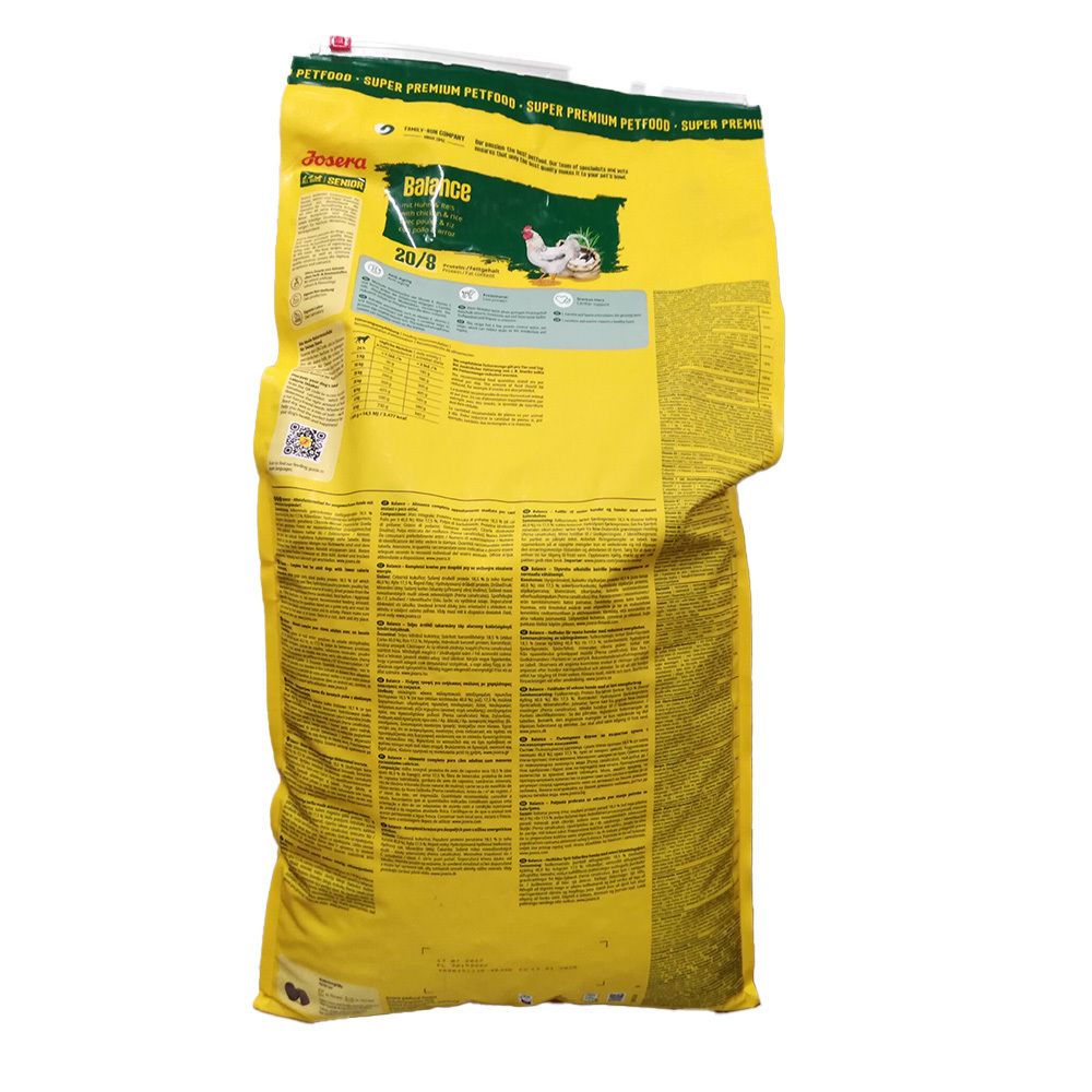 Dos d'un sac jaune. Inscription : Josera Balance. Contient des informations et des valeurs nutritionnelles. Avec illustration de poulet.