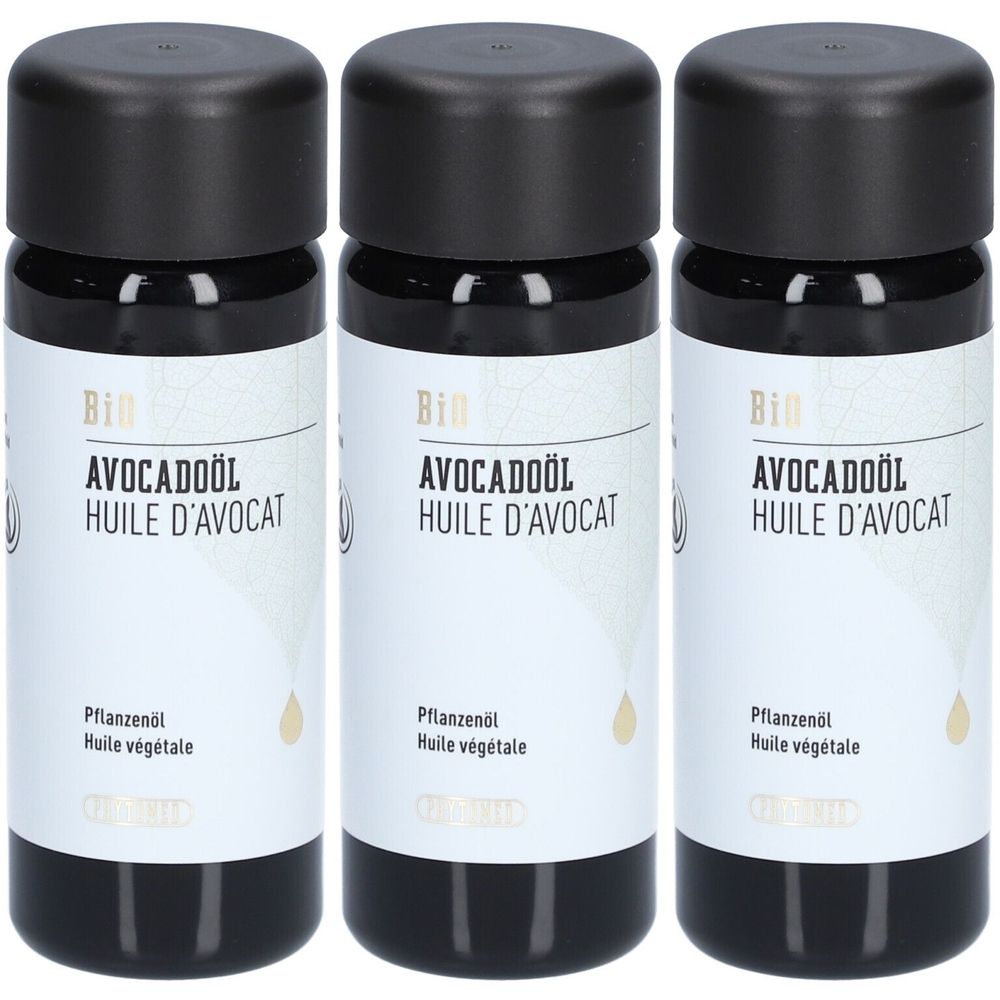 Trois flacons avec bouchons noirs. Inscription: Bio Avocadoöl, Huile d'avocat. Pflanzenöl, Huile végétale.
