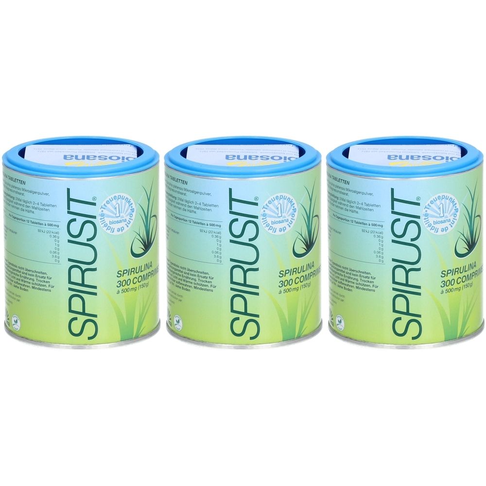 Trois boîtes de SPIRUSIT. Boîtes cylindriques avec couvercle bleu et texte vert. Inscription : SPIRULINA 300 comprimés.