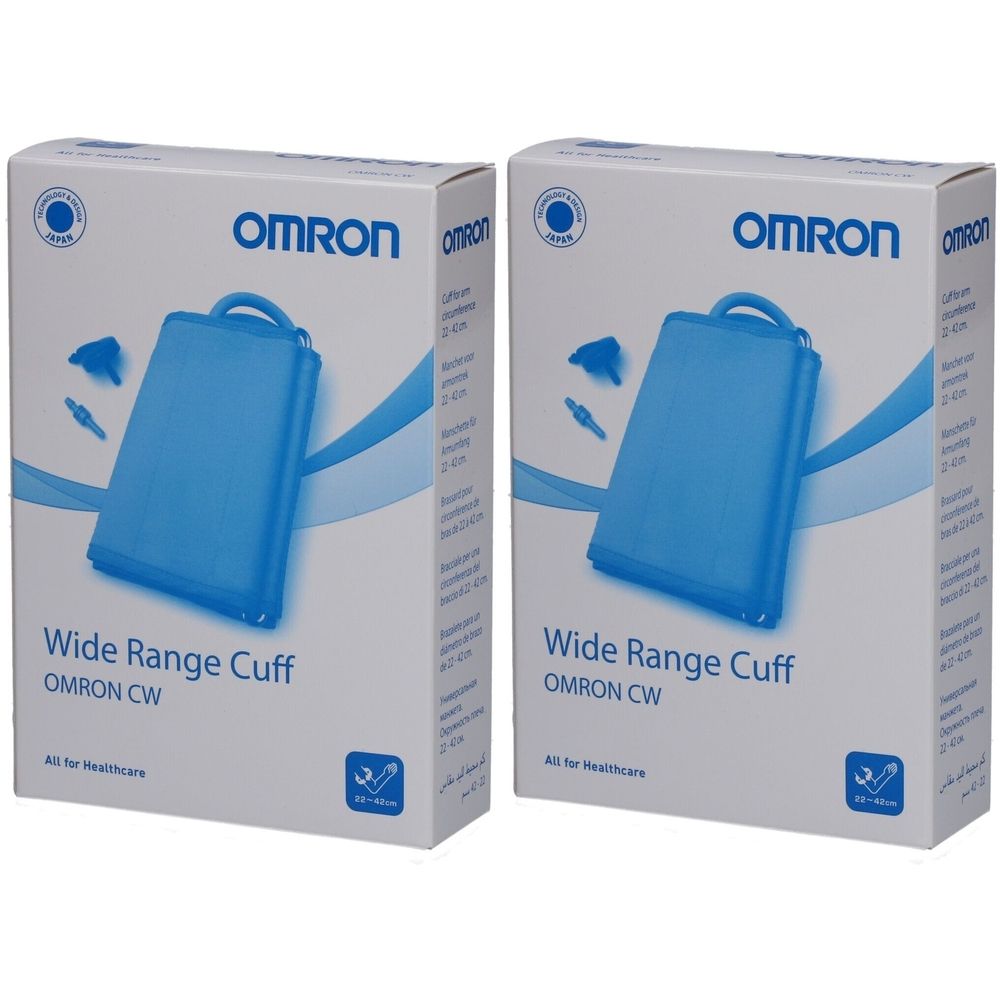 Deux boîtes blanches OMRON. Impression: Wide Range Cuff, OMRON CW. Illustration bleue du brassard. Pour les soins de santé.