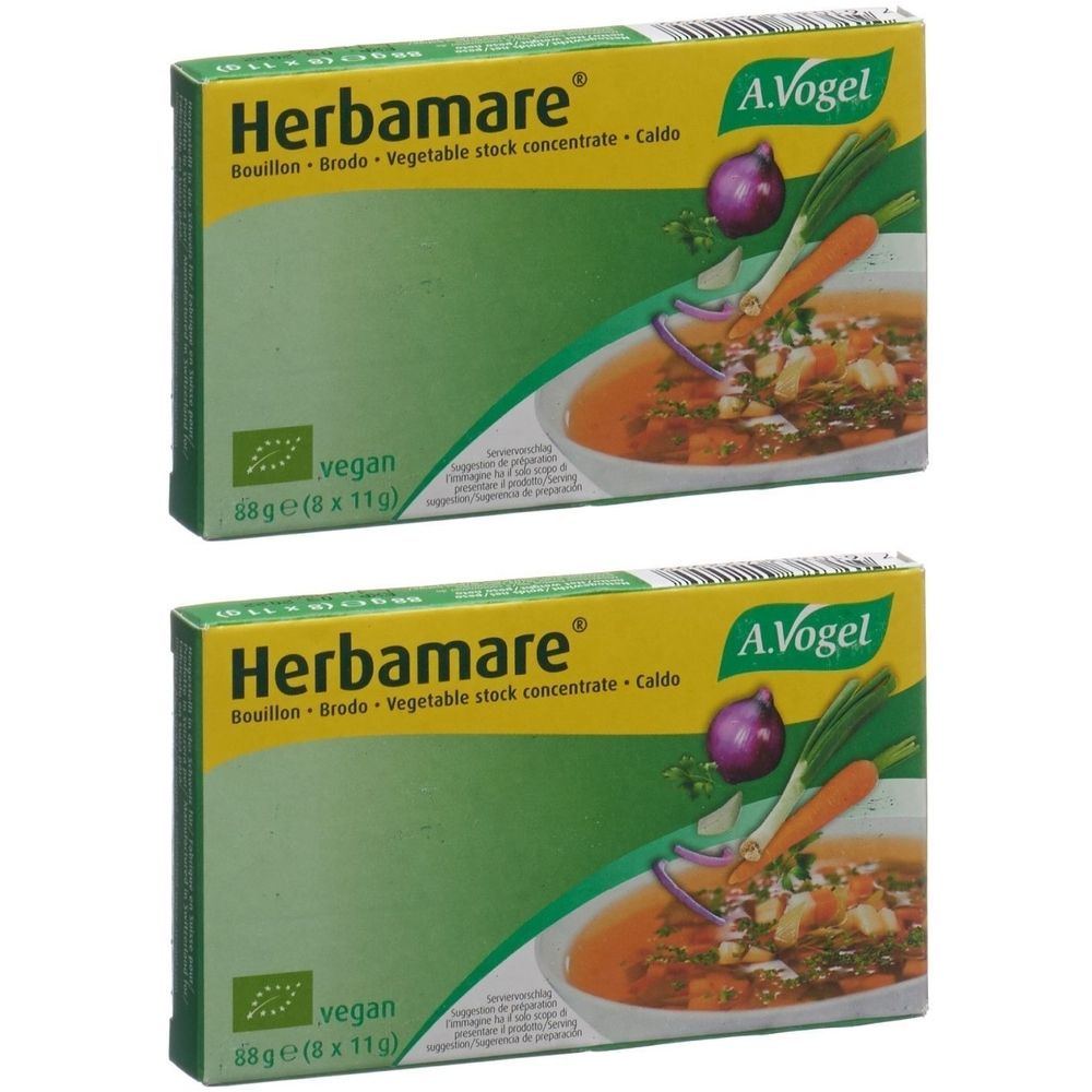 Deux boîtes vertes de bouillon de légumes Herbamare. Inscription : Herbamare, A. Vogel, vegan. Illustration de légumes et de soupe.