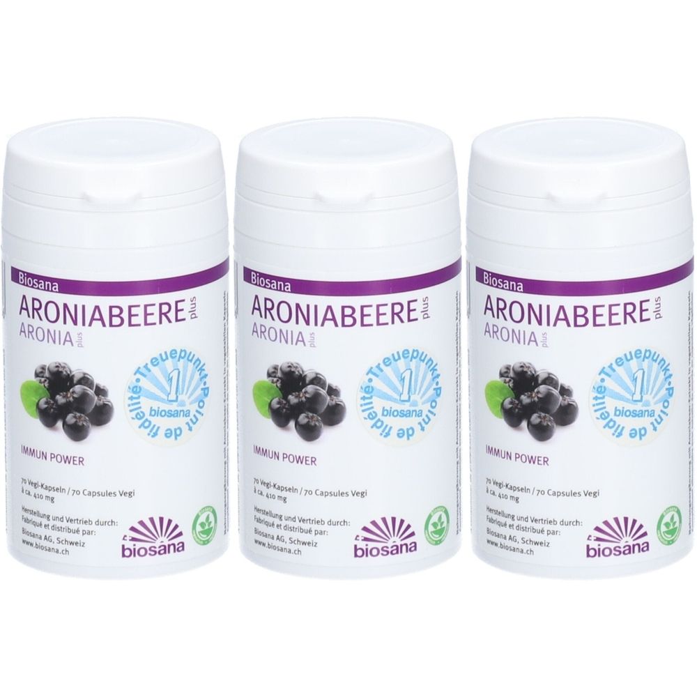 Trois flacons blancs avec des étiquettes violettes. Les étiquettes indiquent "Biosana Aroniabeere plus". Illustration de baies d'aronia.