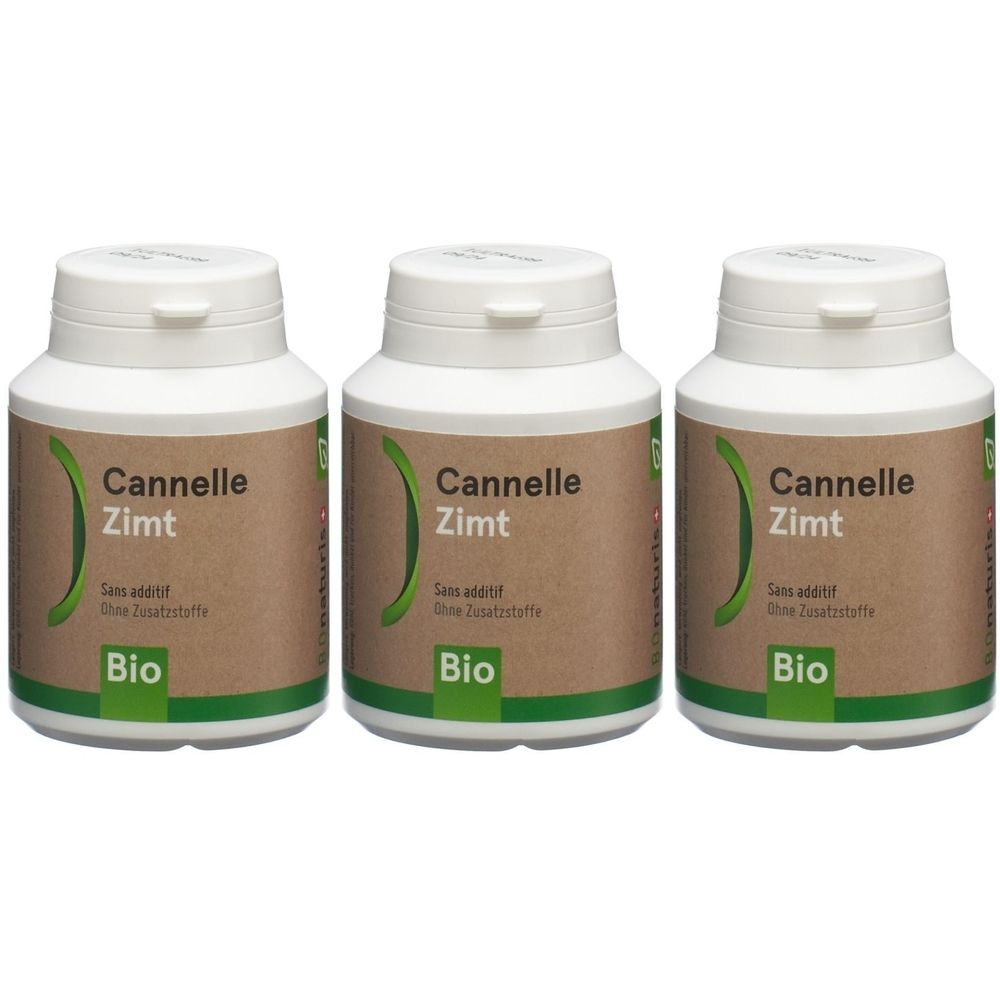 Trois flacons blancs avec étiquettes marron. Inscription : Cannelle Zimt, Sans additif, Bio. Éléments de logo verts.