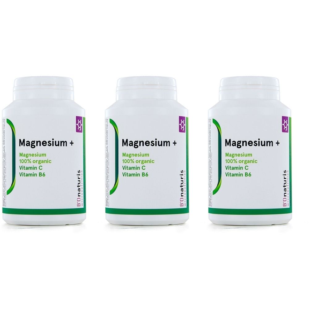 Trois flacons blancs de compléments alimentaires au magnésium. Inscription: Magnesium+, Magnesium, 100% organic, Vitamine C, Vitamine B6. Marque: Bionaturis.