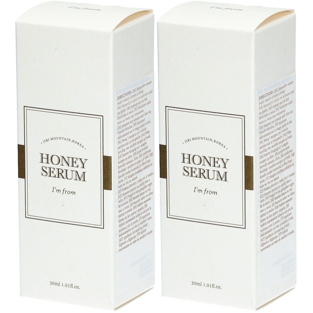 Deux boîtes blanches avec l'inscription HONEY SERUM, I'm from. Inscription : 30ml 1.01fl.oz. Accents marron.