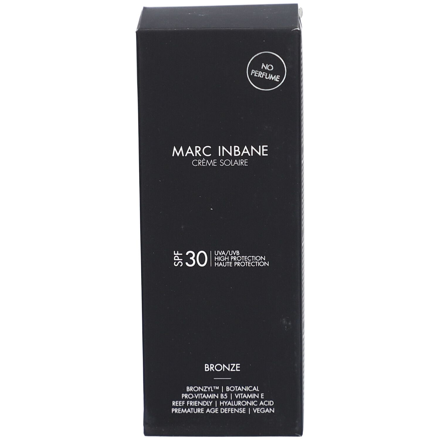 Boîte noire de crème solaire. Inscriptions: Marc Inbane Crème Solaire, SPF 30, Bronze. Avec ingrédients.