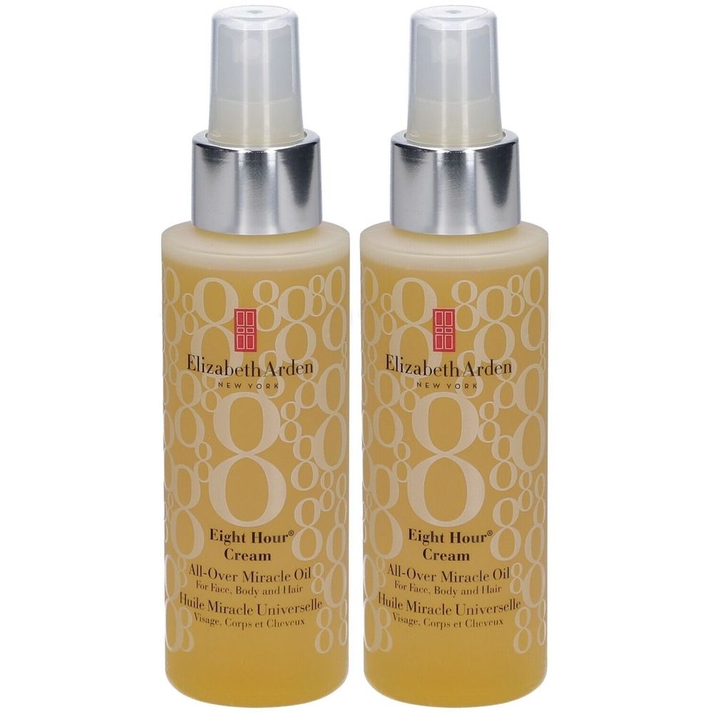 Deux flacons avec vaporisateur. Inscription: Elizabeth Arden Eight Hour Cream All-Over Miracle Oil. Liquide jaune, bouchon argenté.