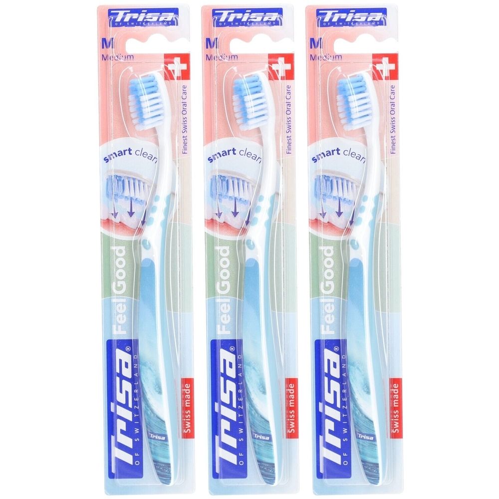 Trois brosses à dents emballées. Marque Trisa, modèle Feel Good. Soies bleues, manche blanc. Medium.