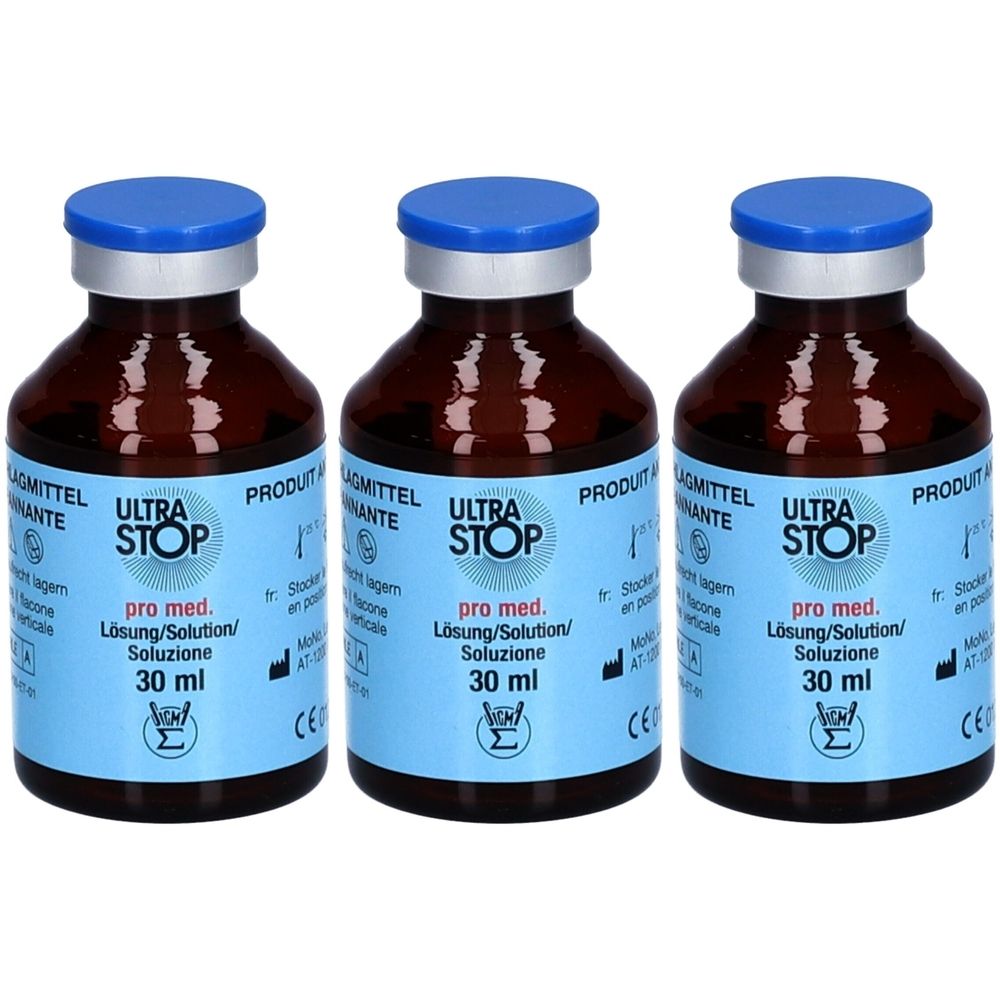 Trois flacons en verre brun avec bouchons bleus. Les étiquettes indiquent "ULTRA STOP pro med. Lösung/Solution/Soluzione 30 ml".