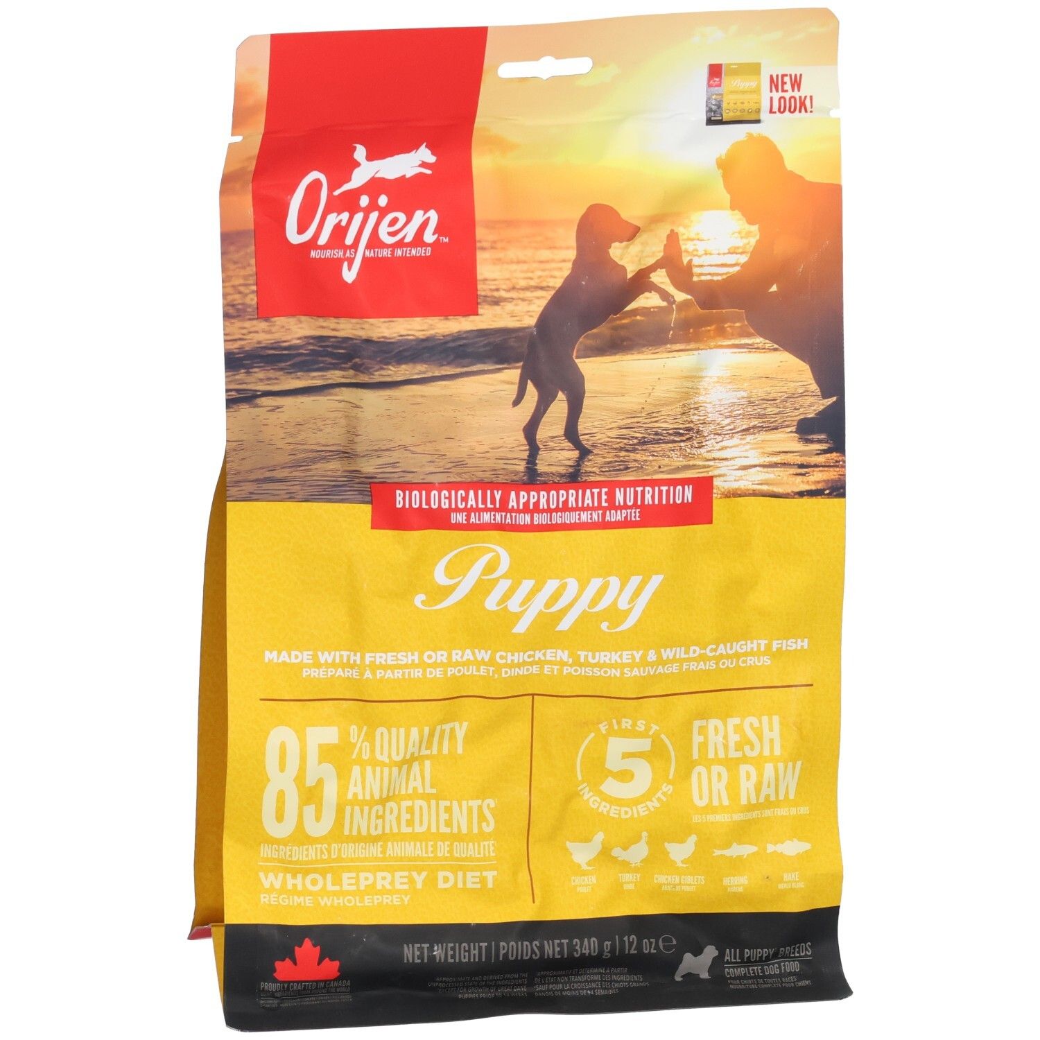 Sac jaune ORIJEN pour chiots. Illustration de chiot et humain. Texte: Puppy, 85% ingrédients animaux, 5 ingrédients frais/crus. Poids net: 340g.