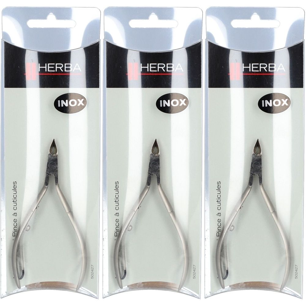 Trois pinces à cuticules HERBA en acier inoxydable, emballées sous blister. Inscription "INOX" et "Pince à cuticules" sur l'emballage.