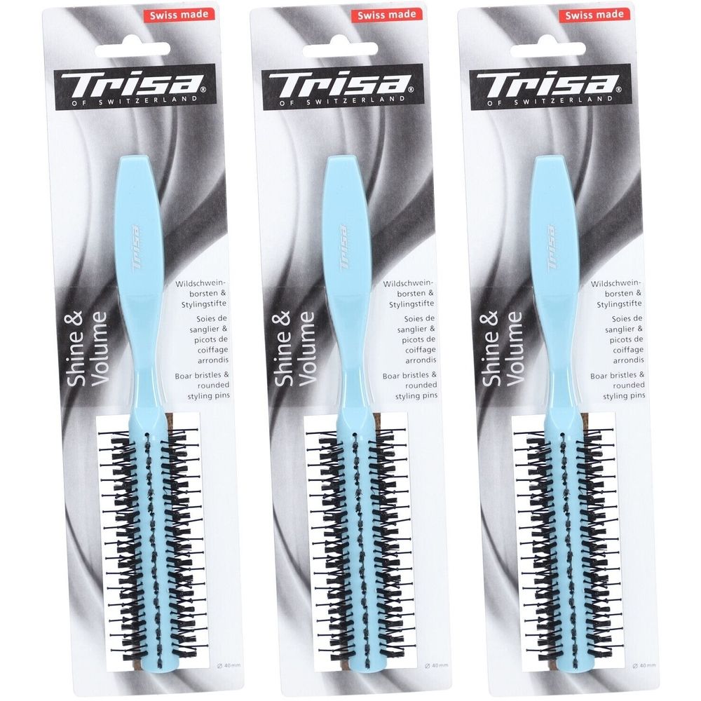 Trois brosses coiffantes emballées. Manche bleu clair, soies noires. Inscriptions: Trisa, Shine & Volume, Swiss made.