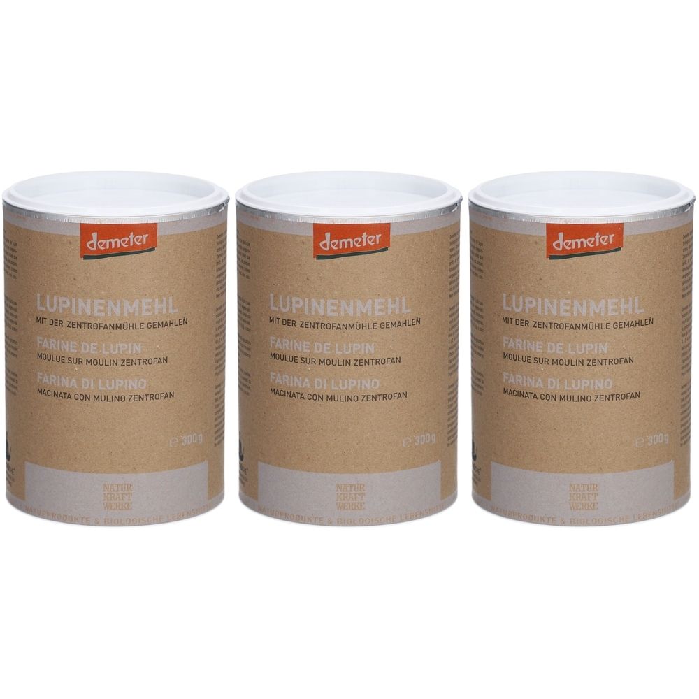 Trois boîtes cylindriques avec couvercles blancs. Inscription: LUPINENMEHL, FARINE DE LUPIN, FARINA DI LUPINO. Marque: demeter.