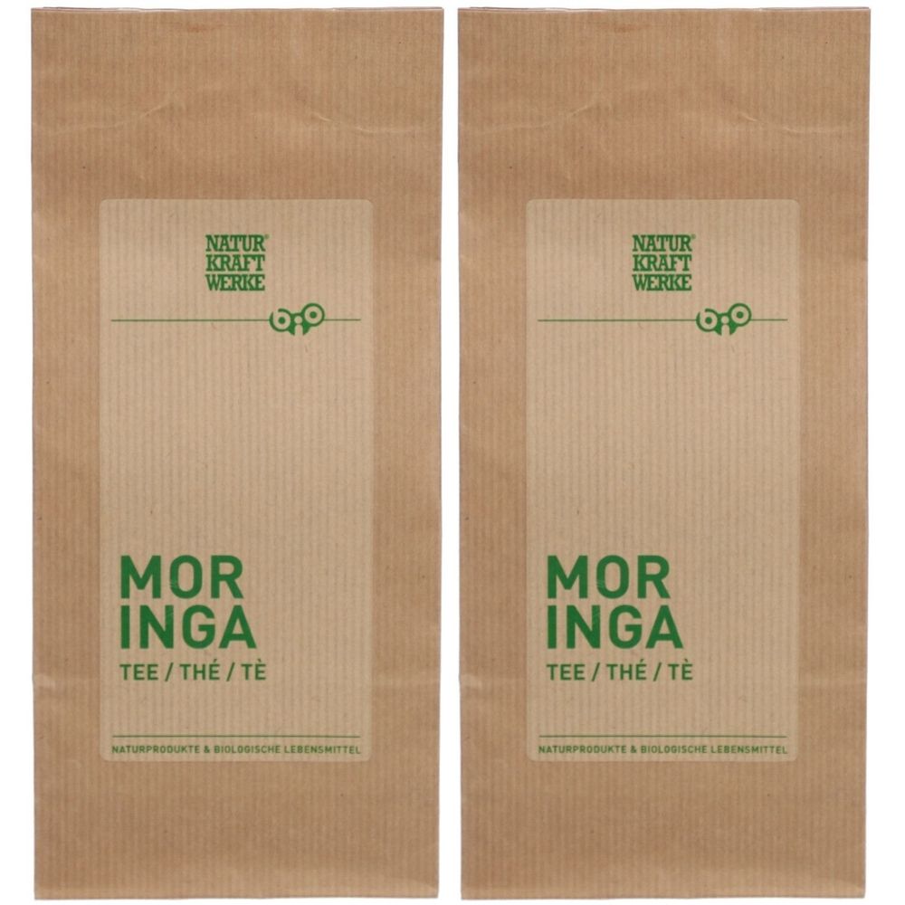 Deux sachets en papier brun avec impression. Chaque sachet porte l'inscription "NATUR KRAFT WERKE" et "MORINGA TEE/THÉ/TÉ".