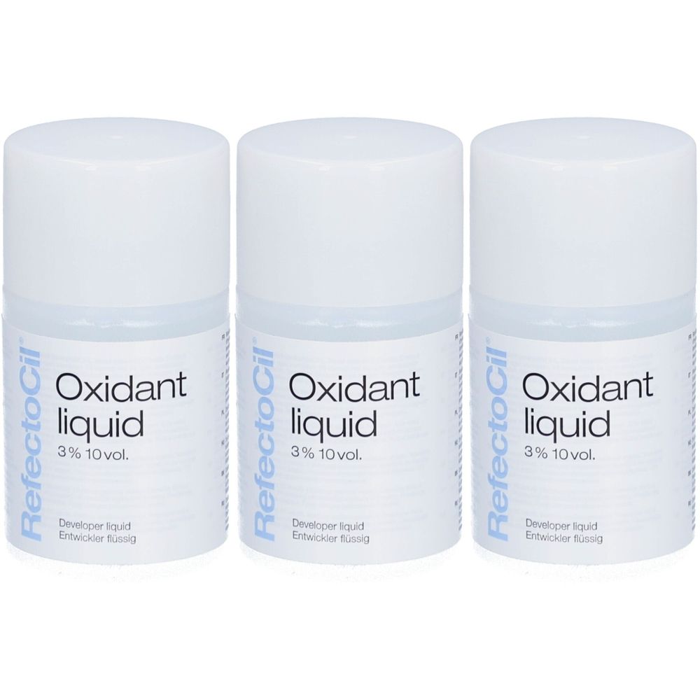 Trois flacons de RefectoCil Oxidant liquid. Flacons blancs avec bouchons blancs. Inscription : Oxidant liquid 3% 10 vol.