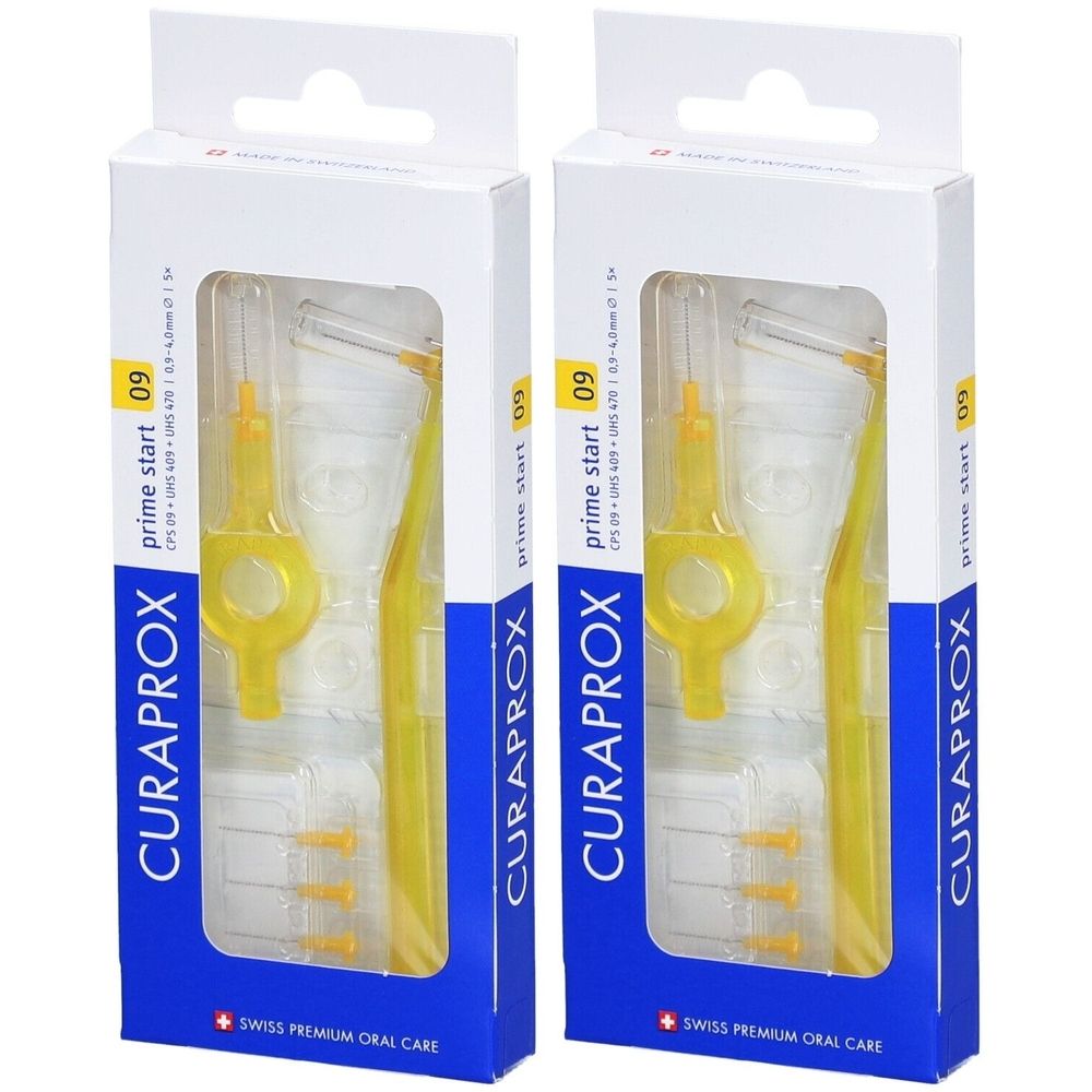 Deux boîtes de brosses interdentaires CURAPROX. Brosses et manches jaunes dans des boîtes blanches. Inscription : prime start 09.