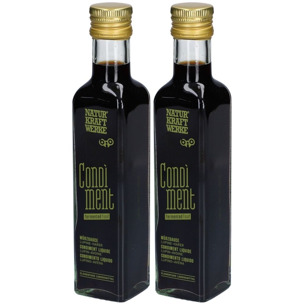 Deux bouteilles avec bouchons dorés. Inscription: NATURKRAFTWERKE, Condiment, sauce, lupin-avoine, condiment liquide, condimentos liquidos.