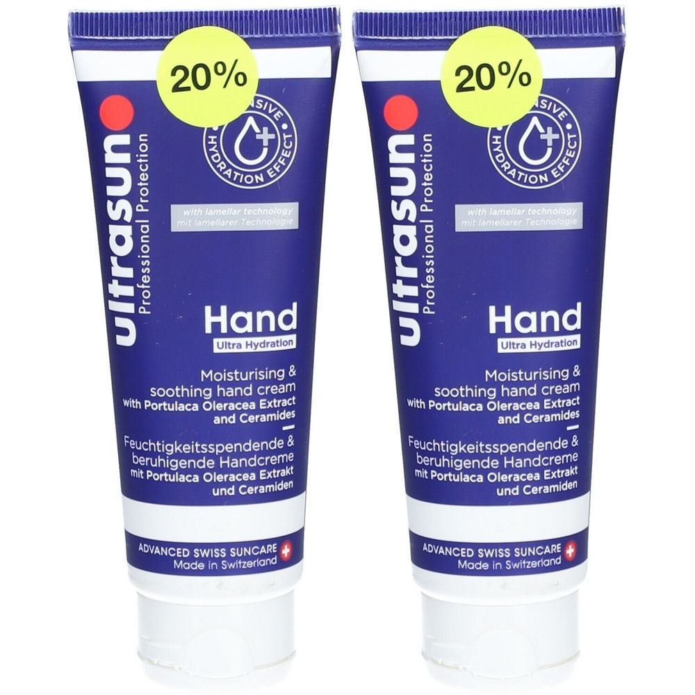 Deux tubes bleus de crème pour les mains. Inscription : Ultrasun, Hand Ultra Hydration. Avec autocollant 20 %.