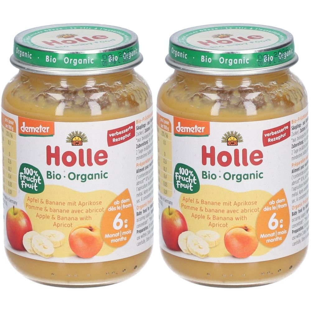 Deux pots de nourriture pour bébé. Inscription : Holle Bio-Organic, Pomme & Banane avec abricot. Label Demeter. Recommandé pour 6 mois.