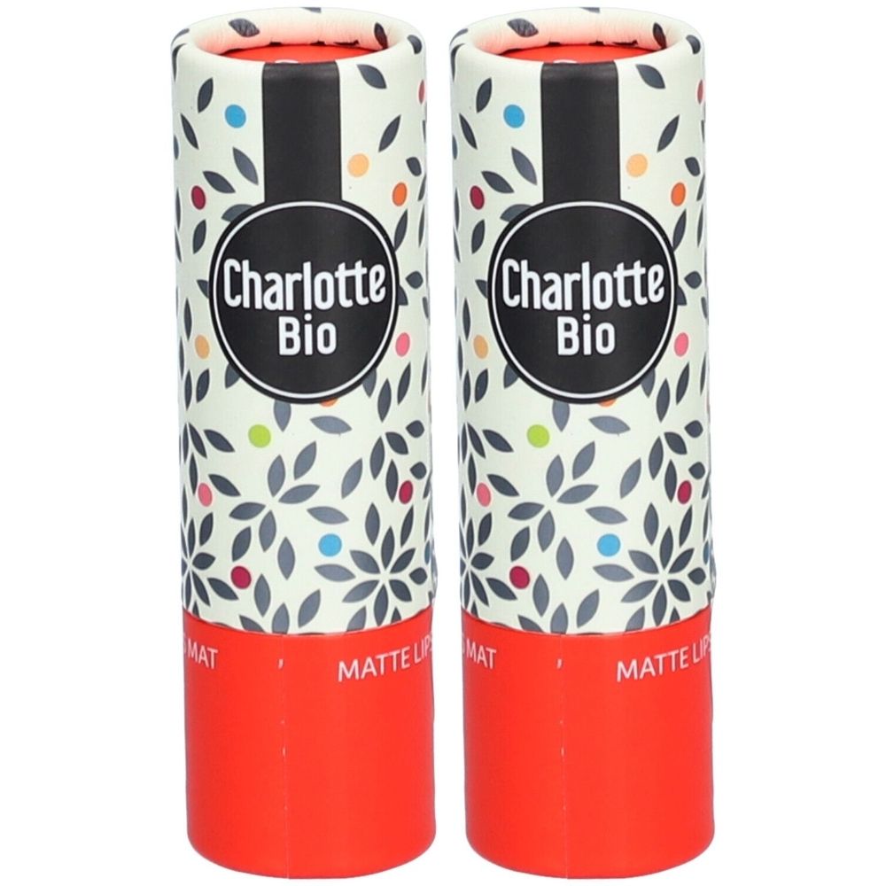 Deux tubes de rouge à lèvres cylindriques. Marque Charlotte Bio. Motif floral avec points colorés. Base rouge. Inscription Matte Lip.