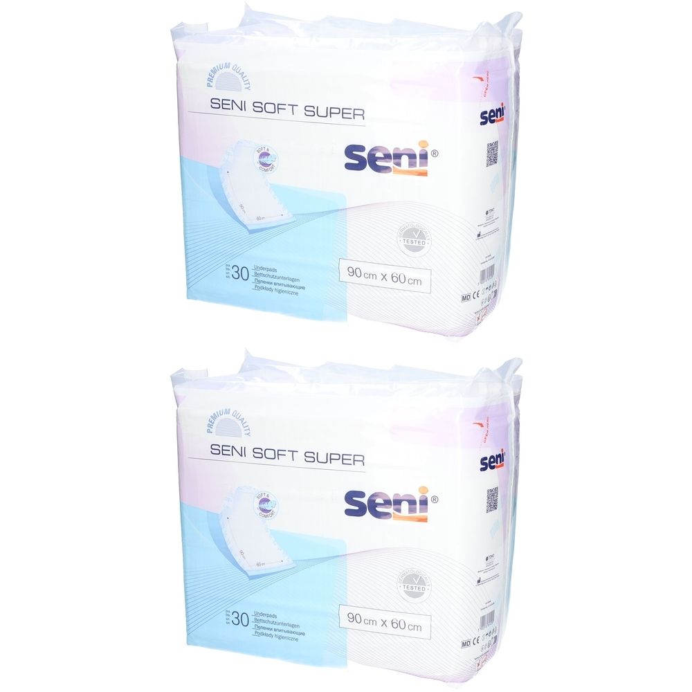 Deux paquets de SENI SOFT SUPER Alèses. Inscription : 90 cm x 60 cm. Marque Seni. Emballage de 30 pièces.