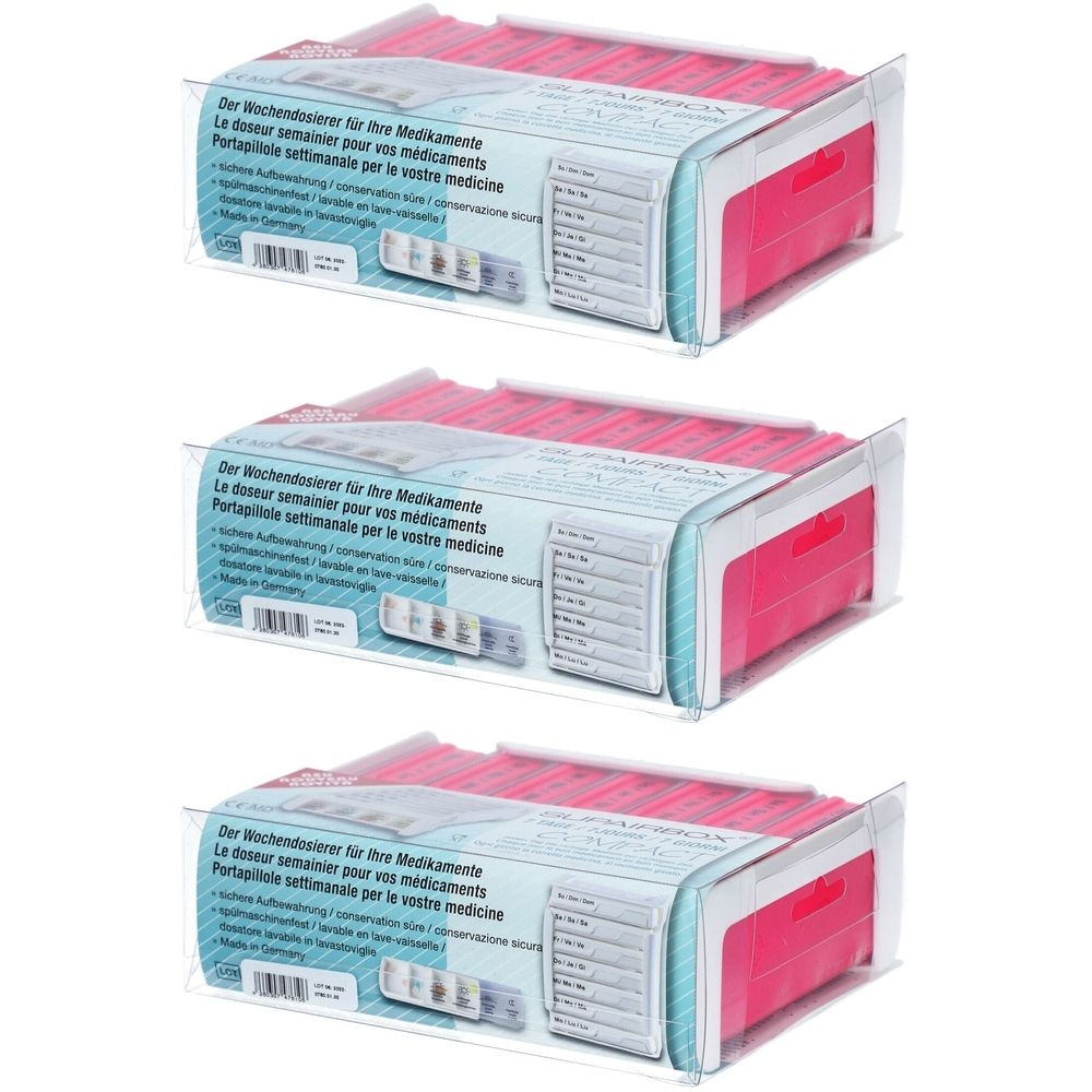 Trois SUPERBOX Semainier Rose emballés. Boîtes à pilules roses avec compartiments hebdomadaires. Texte sur l'emballage.