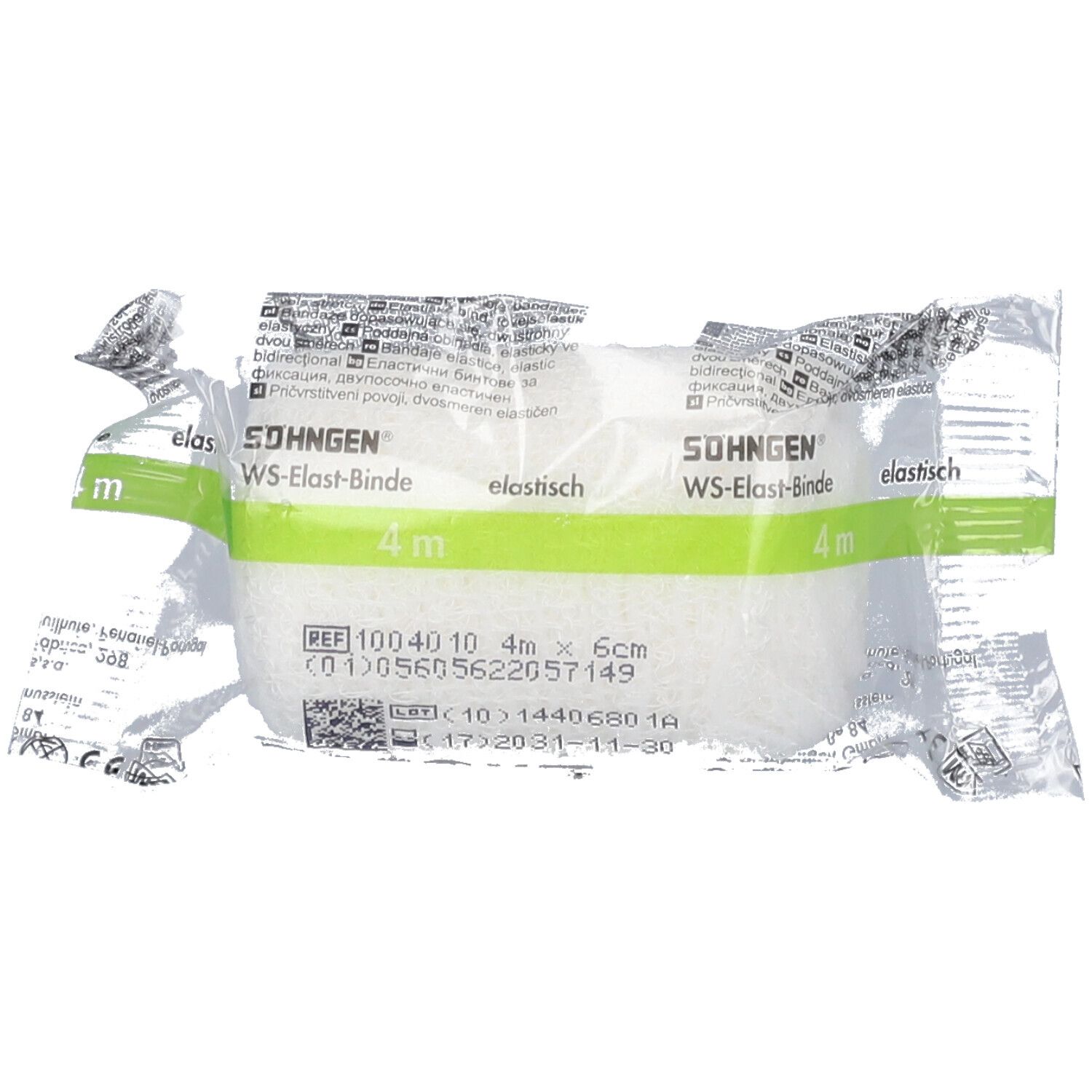 Bande élastique sous emballage plastique. Inscription : WS-Elast-Binde, 4 m x 6 cm. Marque : SÖHNGEN. Bande blanche, emballage vert et blanc.