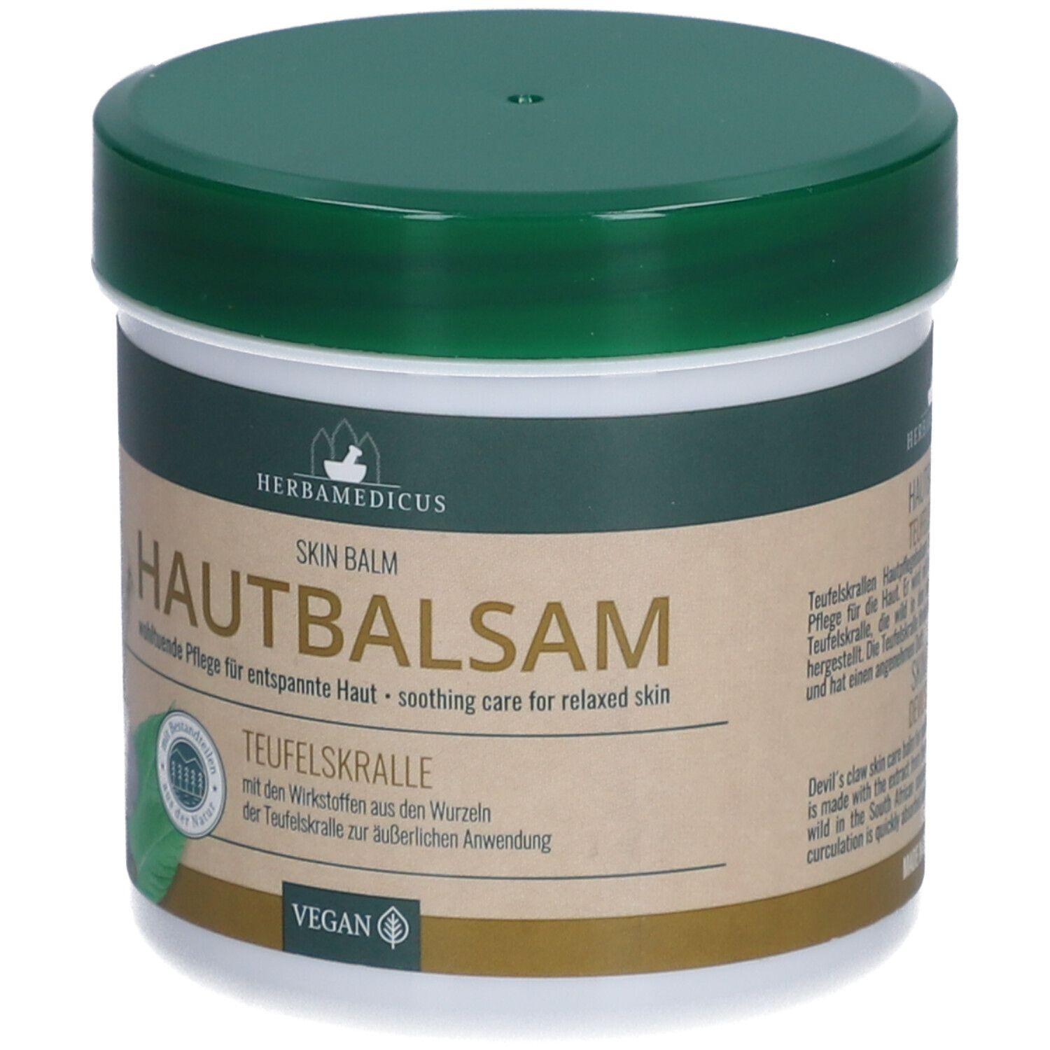Pot blanc avec couvercle vert. Inscription : HAUTBALSAM Teufelskralle. Label végétalien.