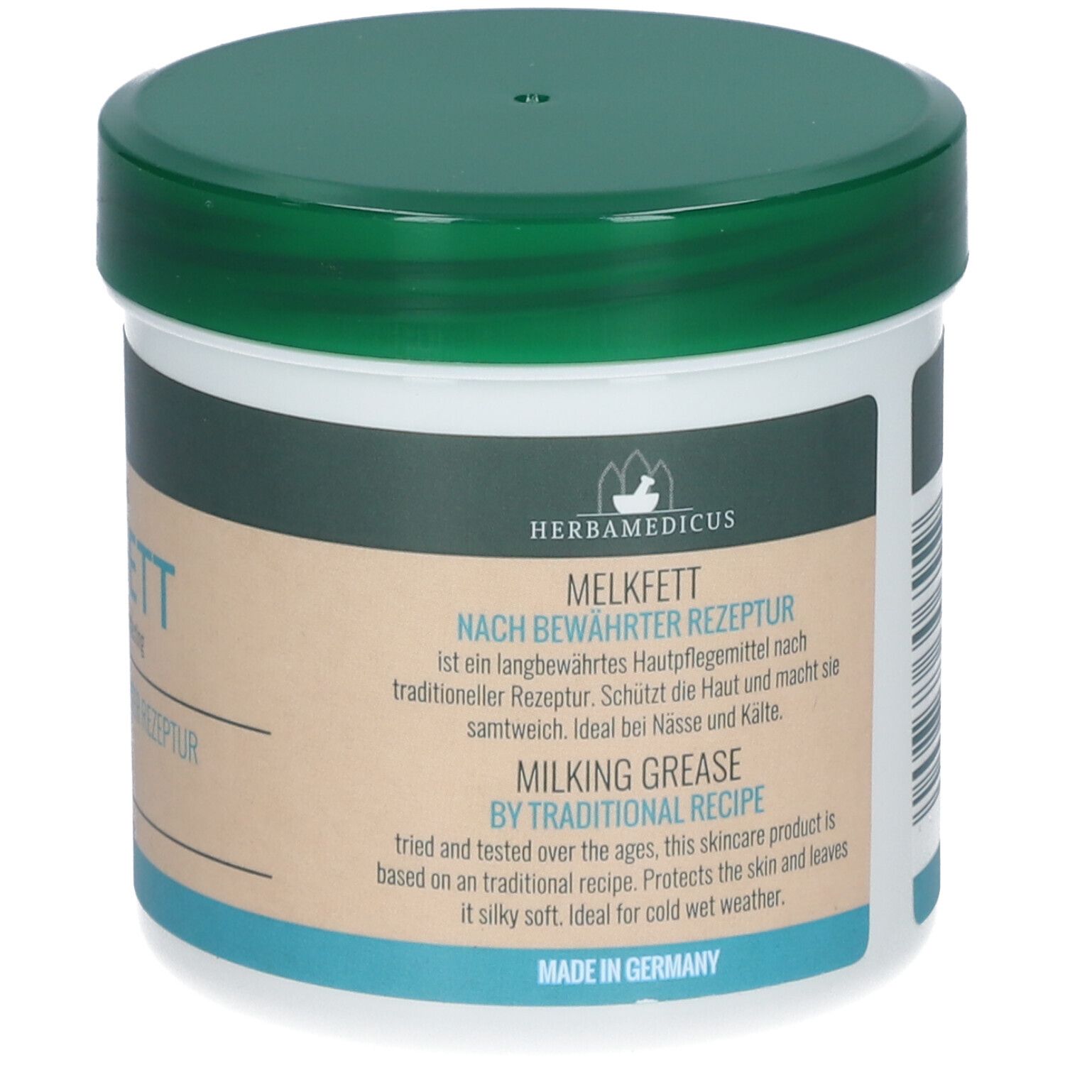 Pot HERBAMEDICUS MELKFETT avec description produit en allemand et anglais, 'Made in Germany'.