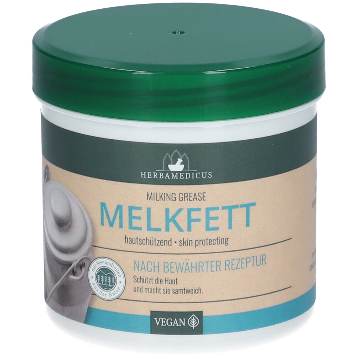 HERBAMEDICUS MELKFETT Crème protectrice dans un pot blanc avec couvercle vert.