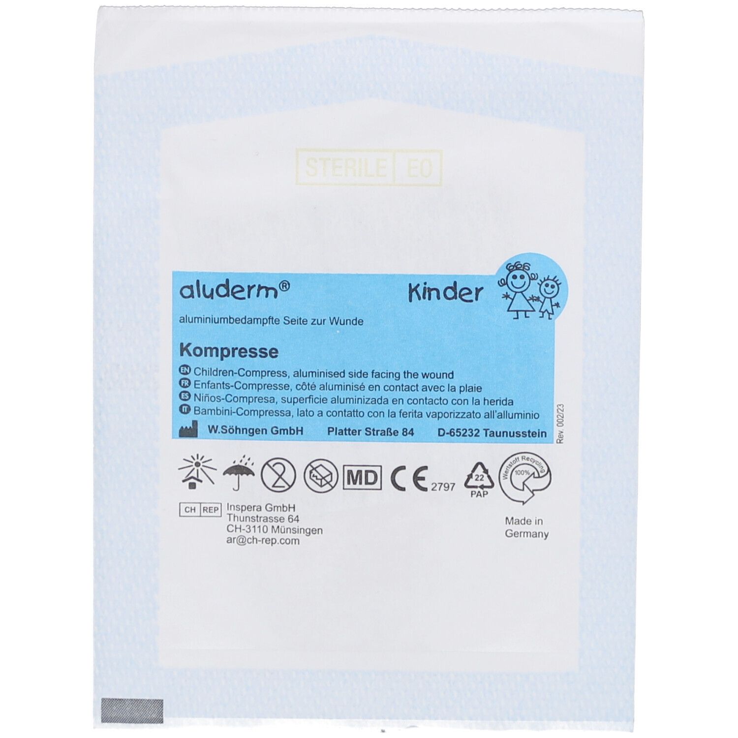 Compresse aluderm® Kinder, emballage bleu. Texte: Kinder, côté aluminisé pour la plaie. Logos et adresse du fabricant.