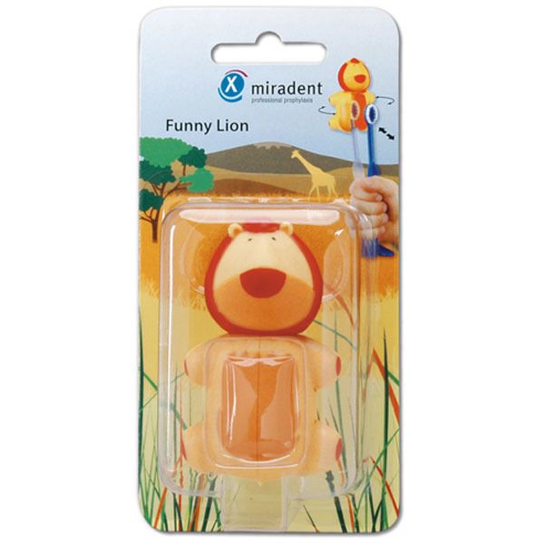 Emballage d'un porte-brosse à dents en forme de lion orange. Le support a une bouche rouge et une crinière jaune. Marque : miradent.