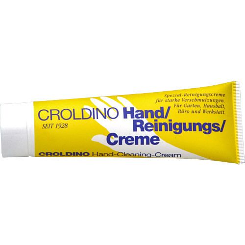 Tube jaune "CROLIDINO Hand/Reinigungs/Creme". Texte: "SEIT 1928".