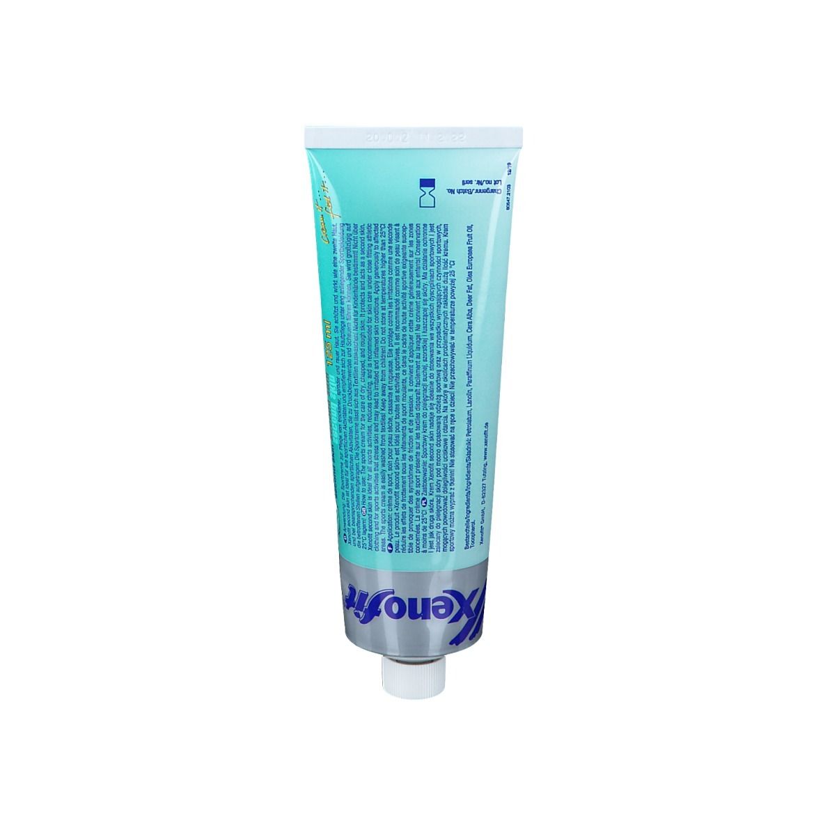 Dos du tube turquoise. Texte en plusieurs langues.