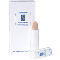 Boîte blanche et deux sticks. Sur la boîte, Sulfoderm, Teint Stick Pastell. Un stick est ouvert.