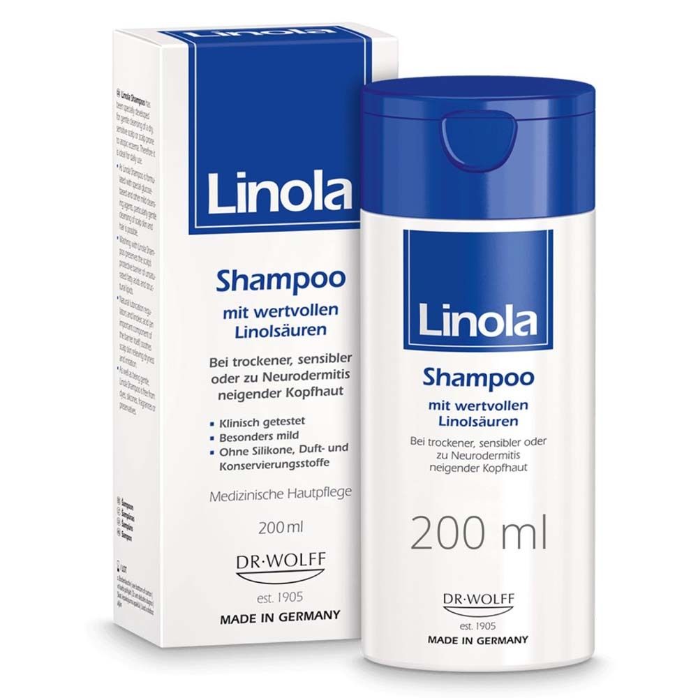 Flacon et emballage de shampooing Linola. Bleu et blanc. Texte : Shampooing, 200 ml, pour cuir chevelu sec et sensible. Dr. Wolff.