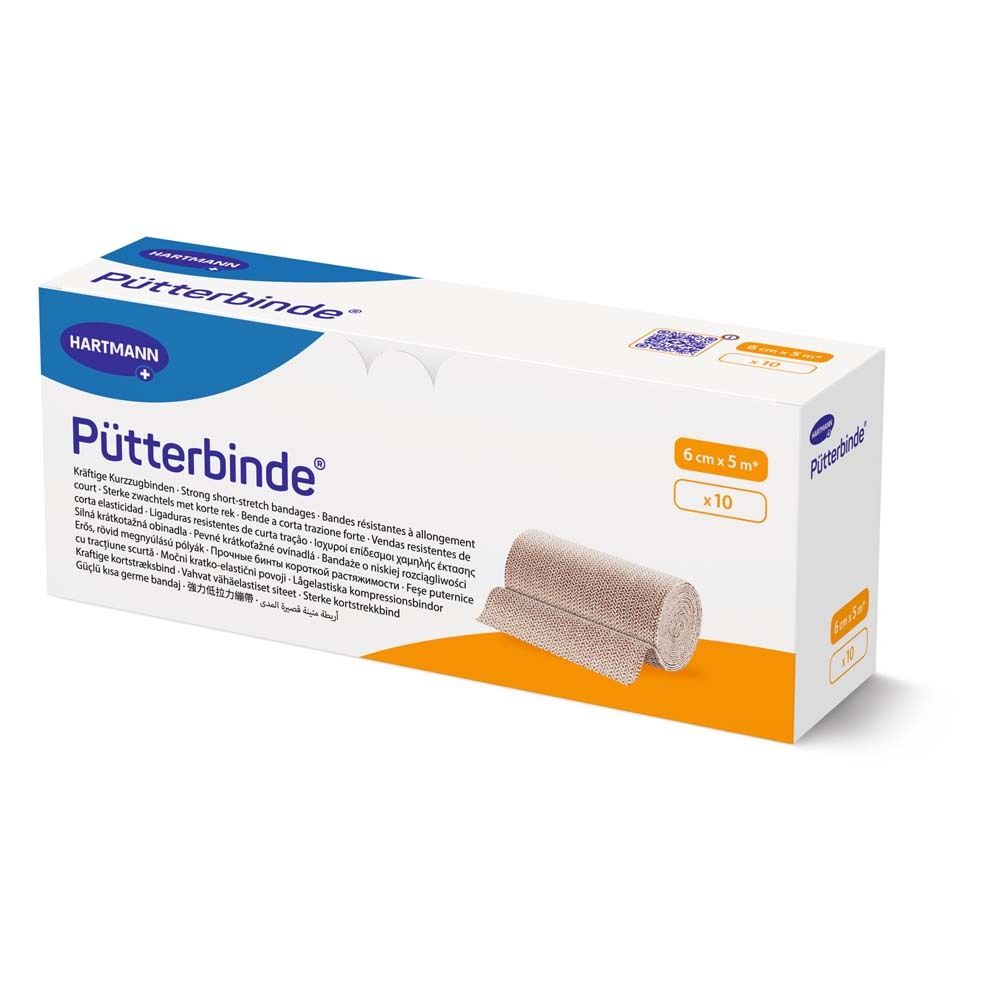 Boîte de Pütterbinde, 6cm x 5m. Marque Hartmann. Contient 10 pièces. Bande élastique beige, partiellement déroulée.